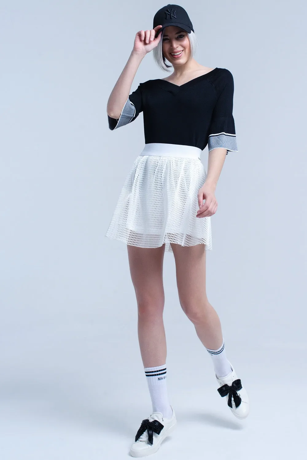 Black knit sweater with bell sleeve