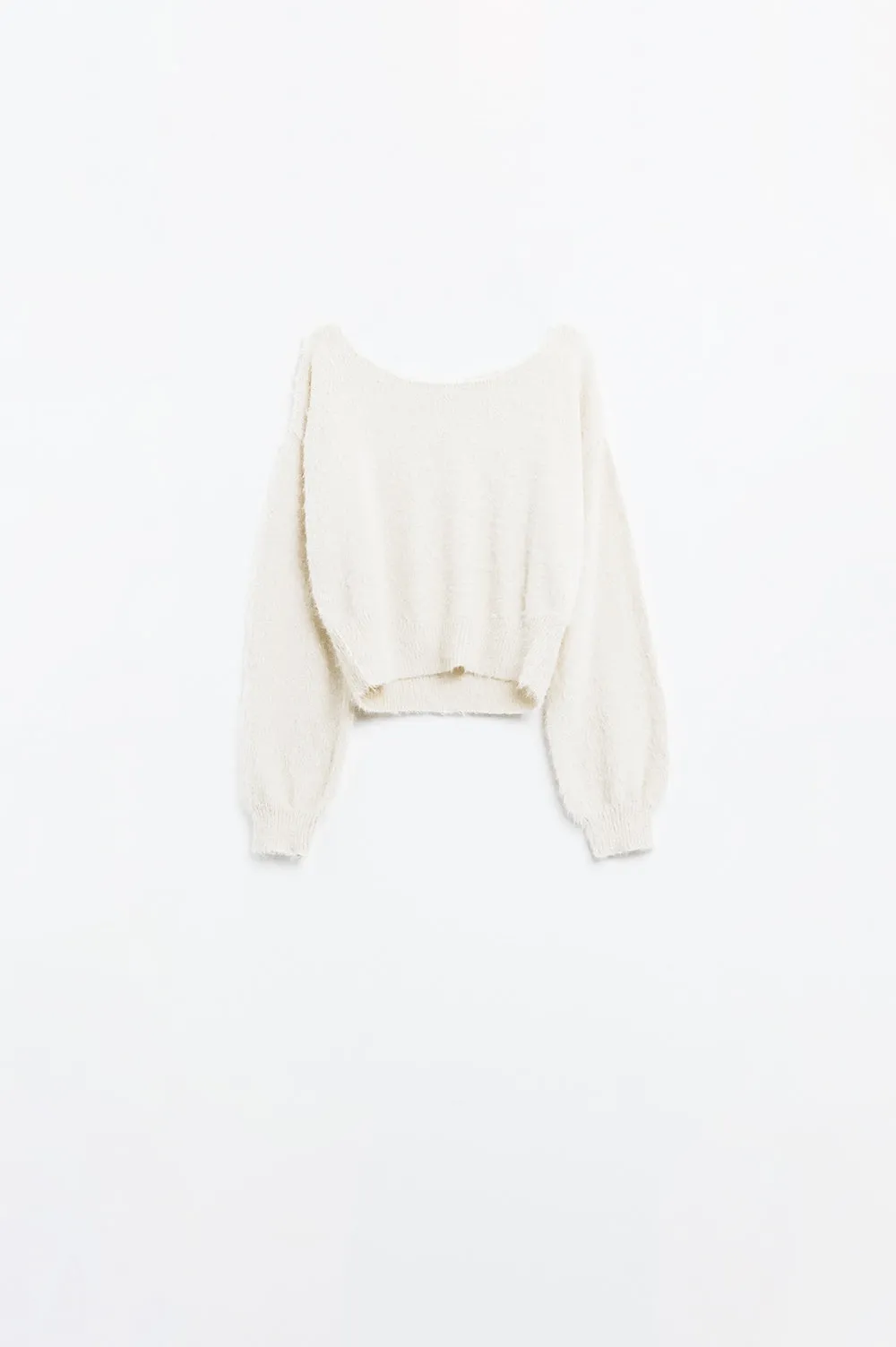cropped fluffy sweater in cream fitted at the waist