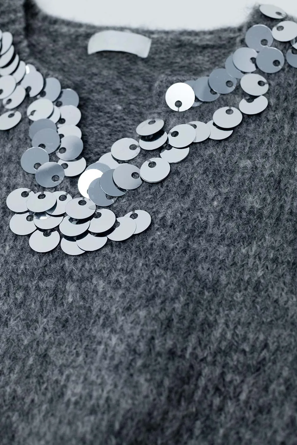 Grey V-neck sweater with sequin detail