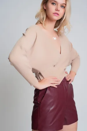 Knitted sweater with wrapped V-neck in beige