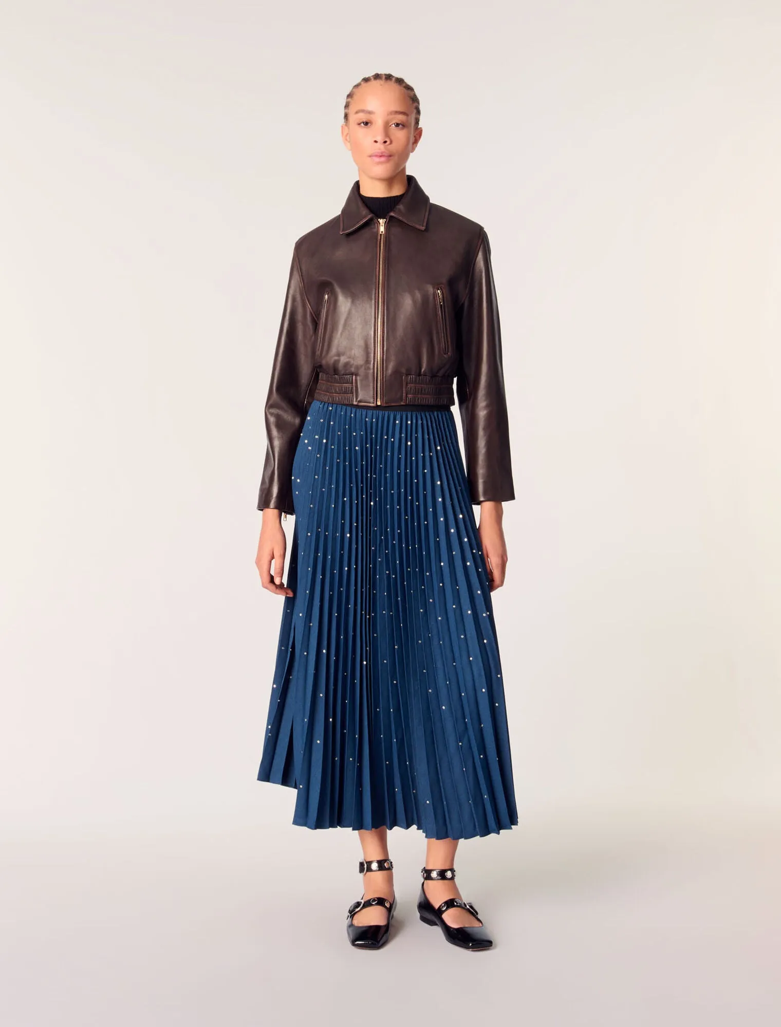Long pleated skirt with studs