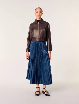 Long pleated skirt with studs