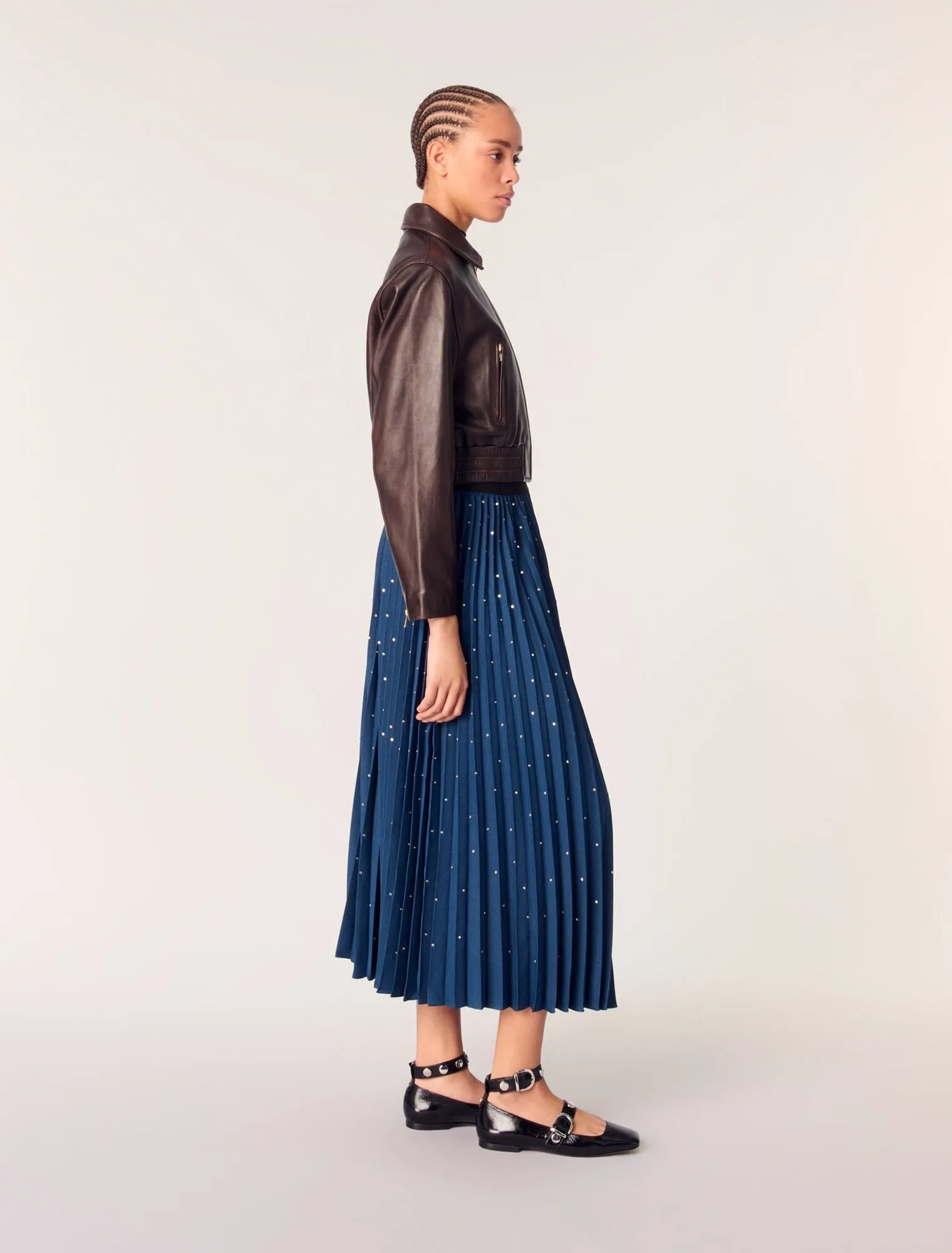 Long pleated skirt with studs