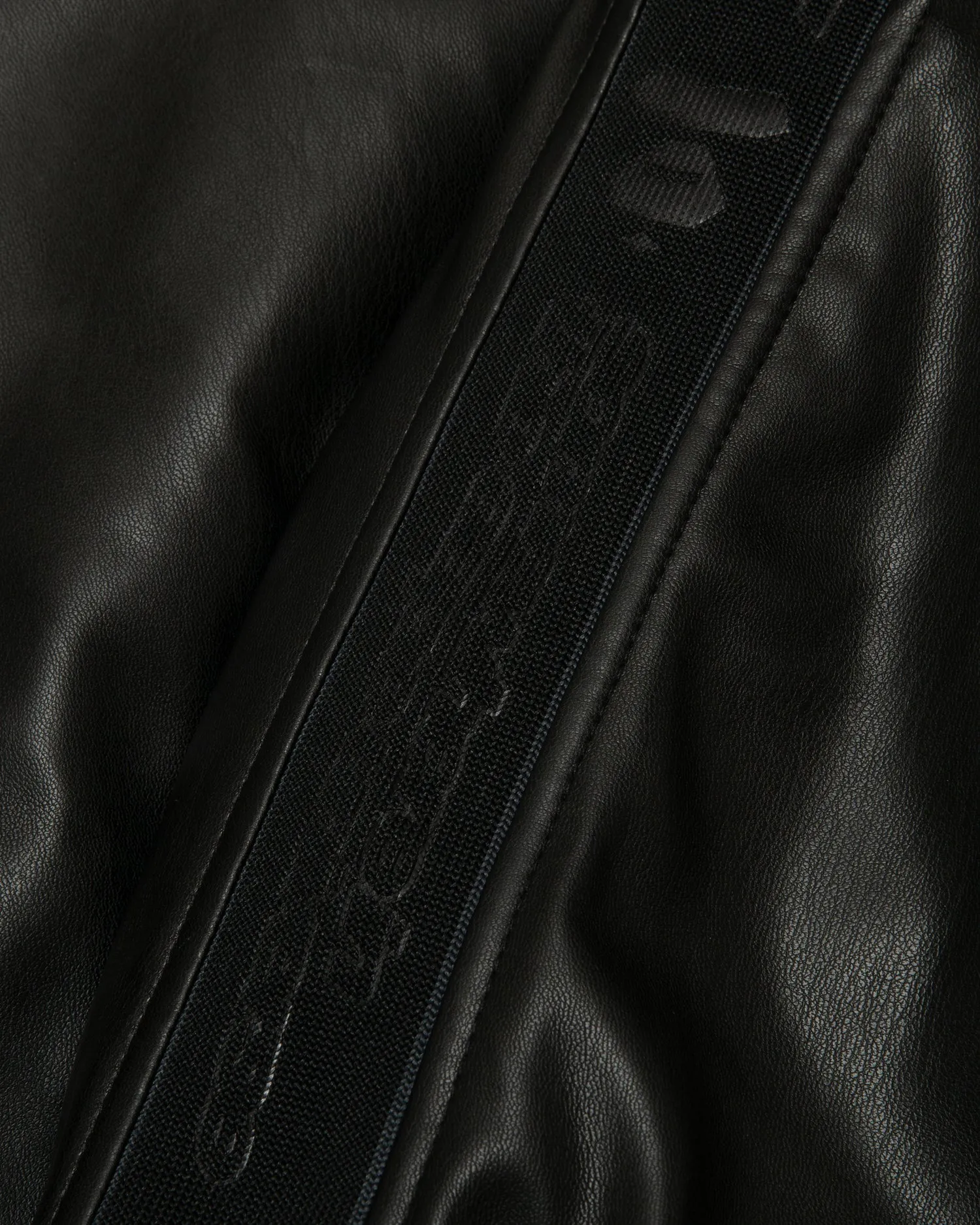 Moonface logo faux leather hooded jacket