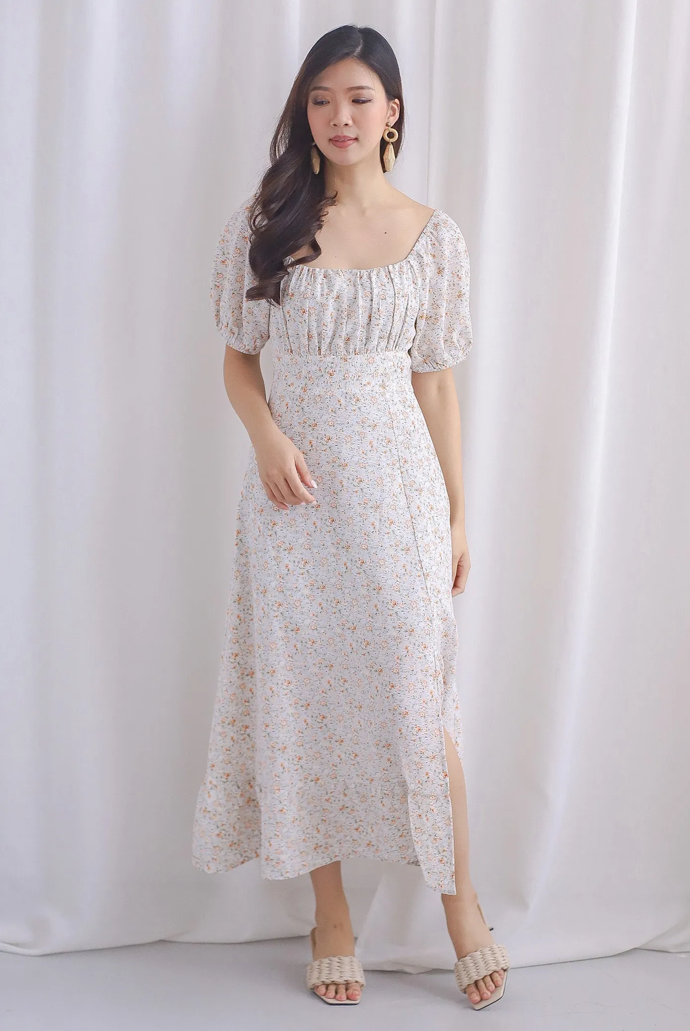 Vandelia Puffy Sleeve Ruched Maxi Dress In Orange Floral