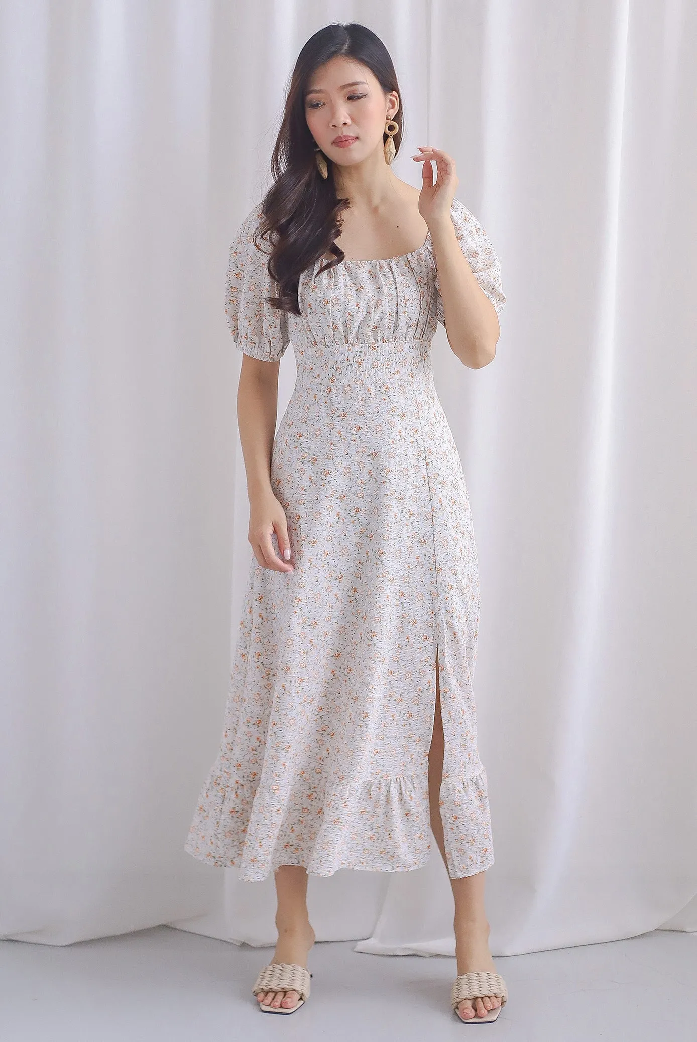 Vandelia Puffy Sleeve Ruched Maxi Dress In Orange Floral