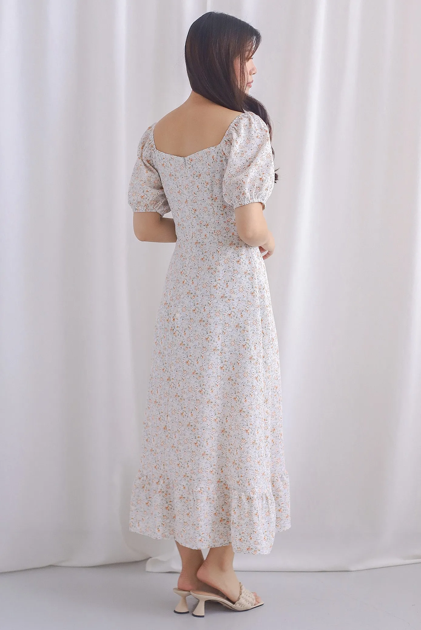 Vandelia Puffy Sleeve Ruched Maxi Dress In Orange Floral